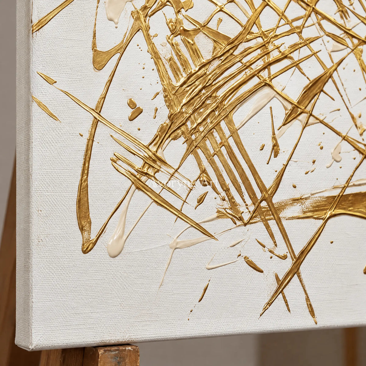 Close-up of the hand-painted texture of Golden Prelude linear abstract wall art on an easel