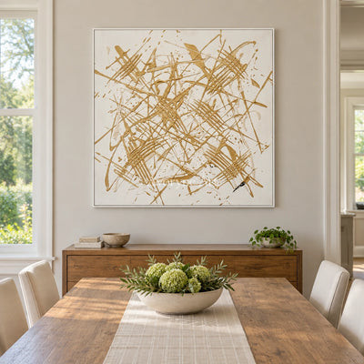 Golden Prelude linear abstract wall art with a white frame in a dining room