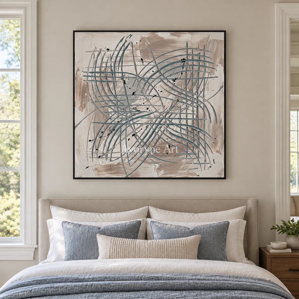 Golden Story linear abstract wall art with a black frame above a bed in a bedroom
