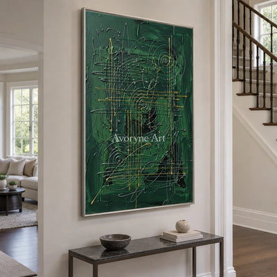 Golden Vista linear abstract wall art with a silver frame in an entryway