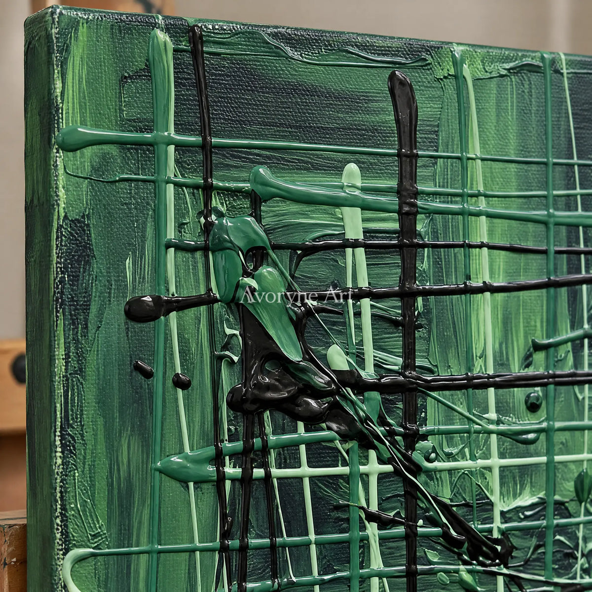 Close-up of the hand-painted texture of Golden Current linear abstract wall art on an easel
