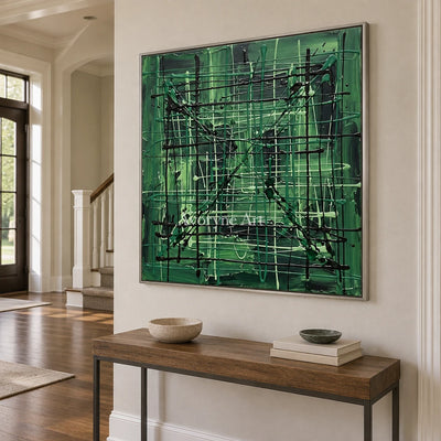 Golden Current linear abstract wall art with a silver frame in an entryway