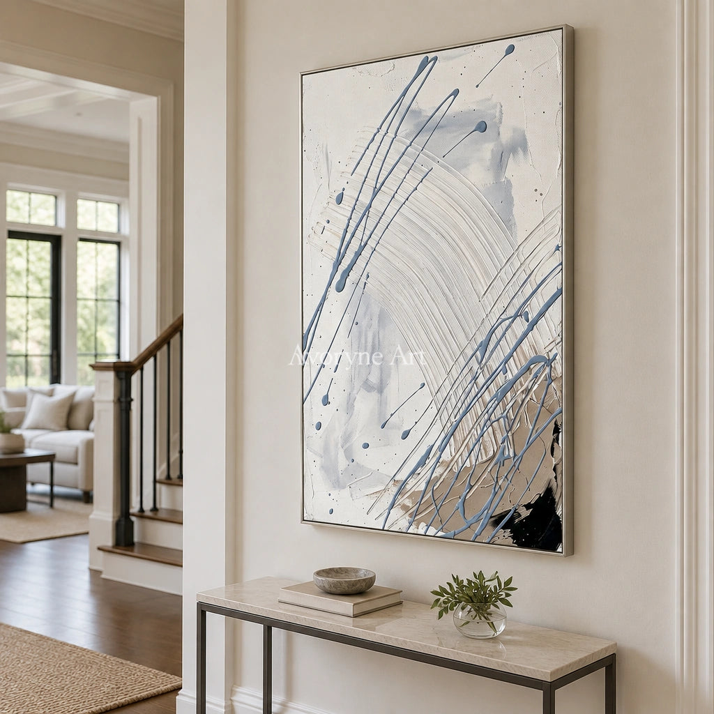 Golden Dialogue linear abstract wall art with a silver frame in an entryway
