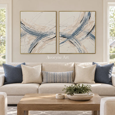 Golden Drift linear abstract diptych with a gold frame hanging in a living room