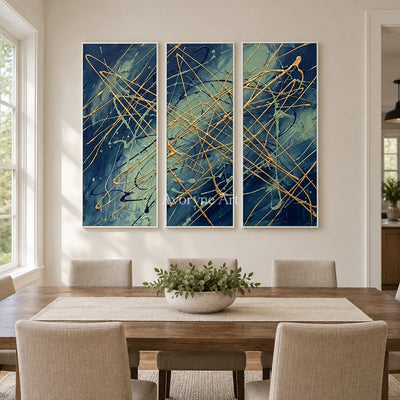 Silver Vista linear abstract triptych with a white frame in a dining room