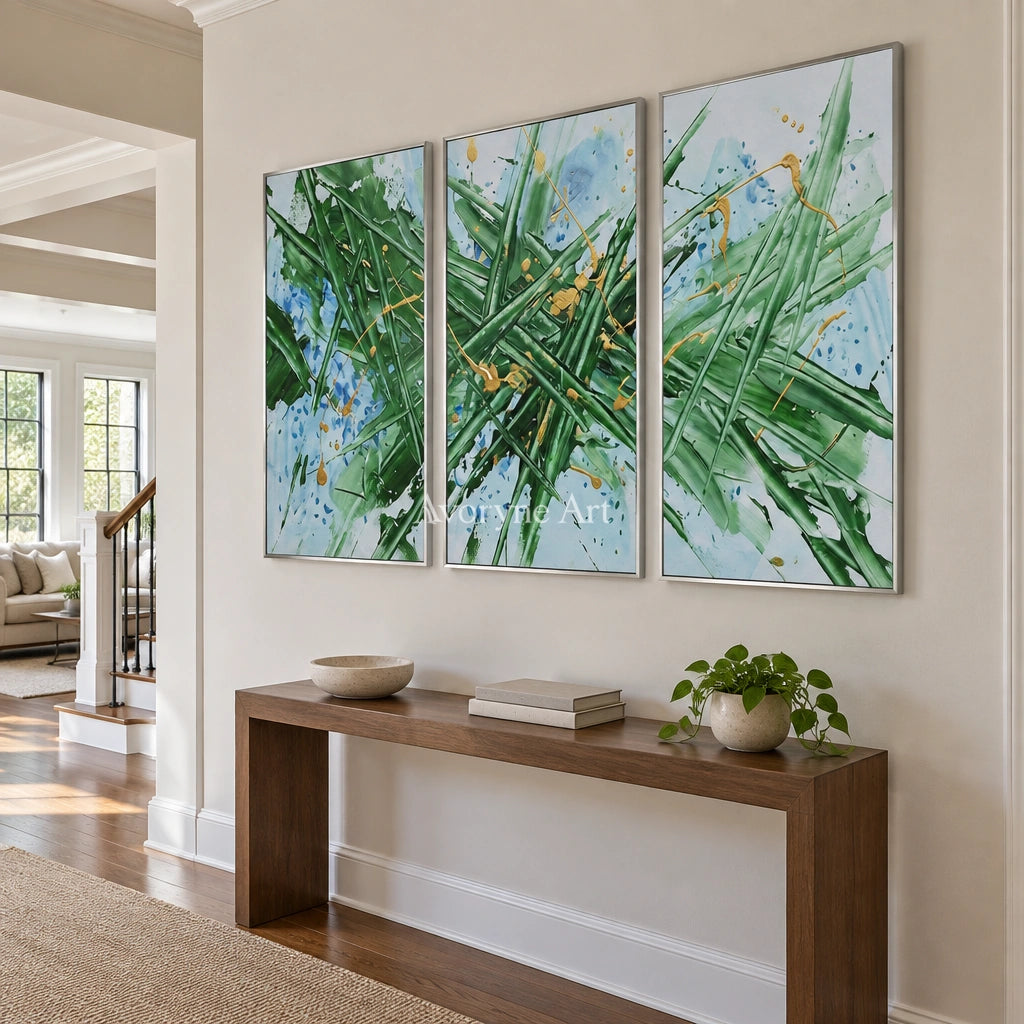 Golden Memory linear abstract triptych with a silver frame in an entryway