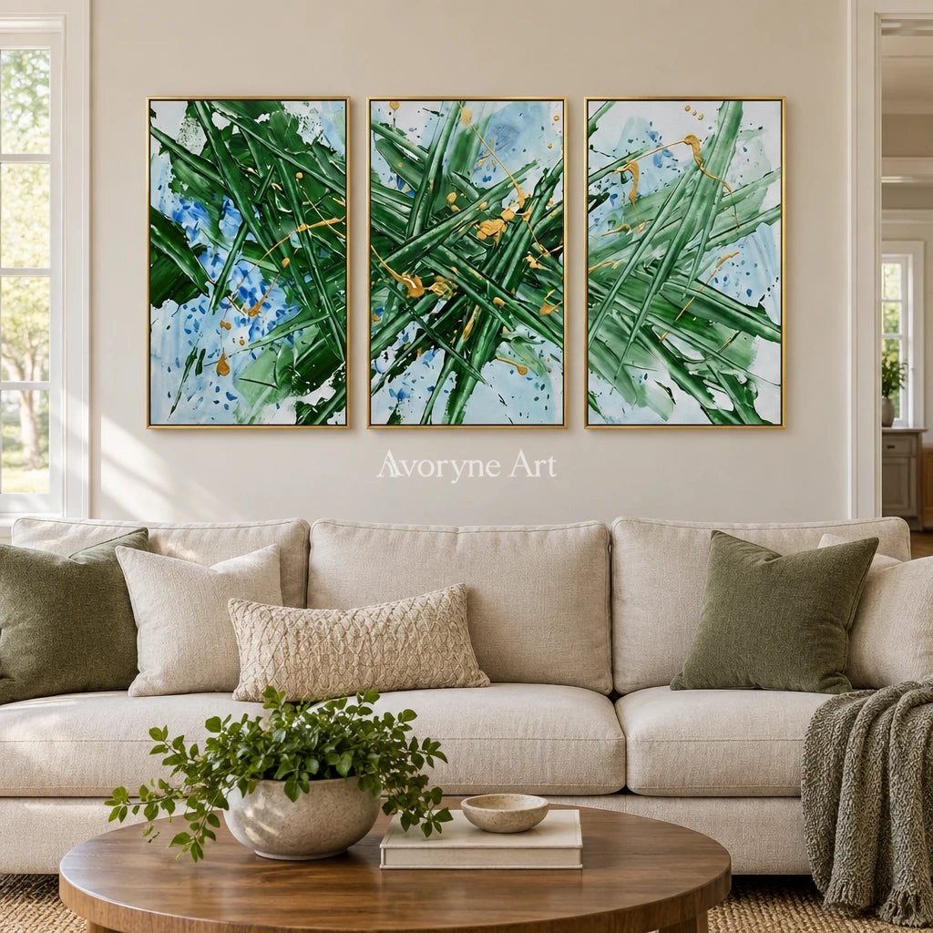 Golden Memory linear abstract triptych with a gold frame hanging in a living room
