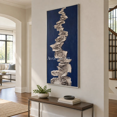 Amber Cadence mineral texture wall art with a silver frame in an entryway