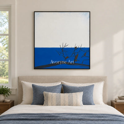 Deep Reverie minimal branch wall art with a black frame above a bed in a bedroom