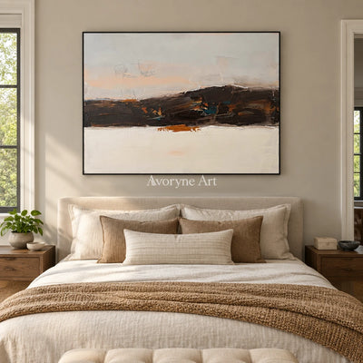 Blue Trace minimal landscape wall art with a black frame above a bed in a bedroom