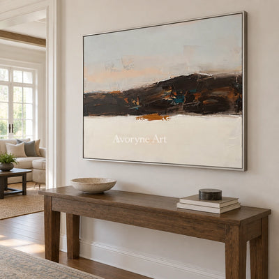 Blue Trace minimal landscape wall art with a silver frame in an entryway