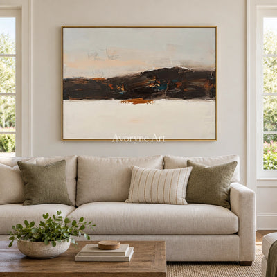 Blue Trace minimal landscape wall art with a gold frame hanging in a living room