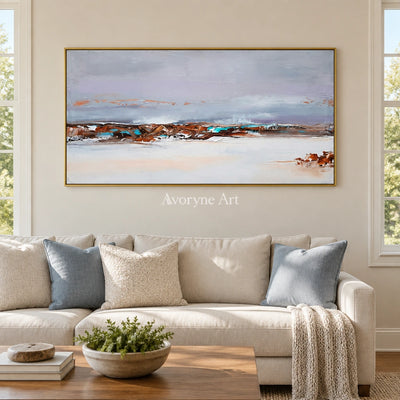 Blue Reverberation minimal landscape wall art with a gold frame hanging in a living room
