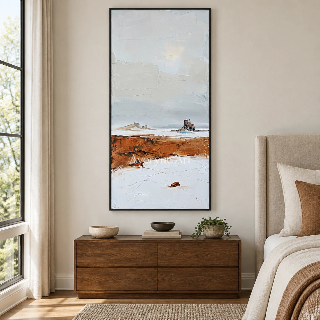 Pale Reverie minimal landscape wall art with a black frame above a bed in a bedroom