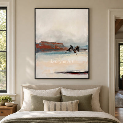 Pale Echo minimal landscape wall art with a black frame above a bed in a bedroom