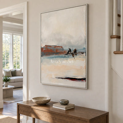 Pale Echo minimal landscape wall art with a silver frame in an entryway