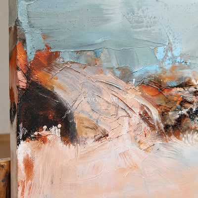 Close-up of the hand-painted texture of Pale Current minimal landscape wall art on an easel