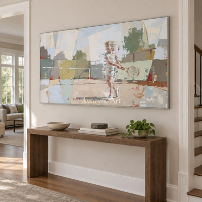 Faint Reverberation motion figure wall art with a silver frame in an entryway