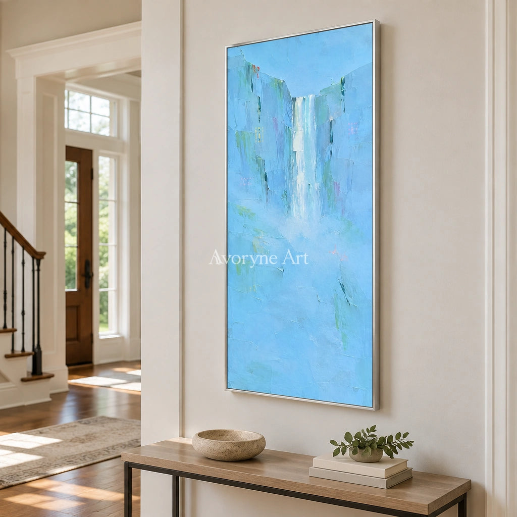 Tender Mosaic mountain landscape wall art with a silver frame in an entryway