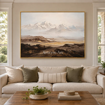 Winding Horizon mountain landscape wall art with a gold frame hanging in a living room