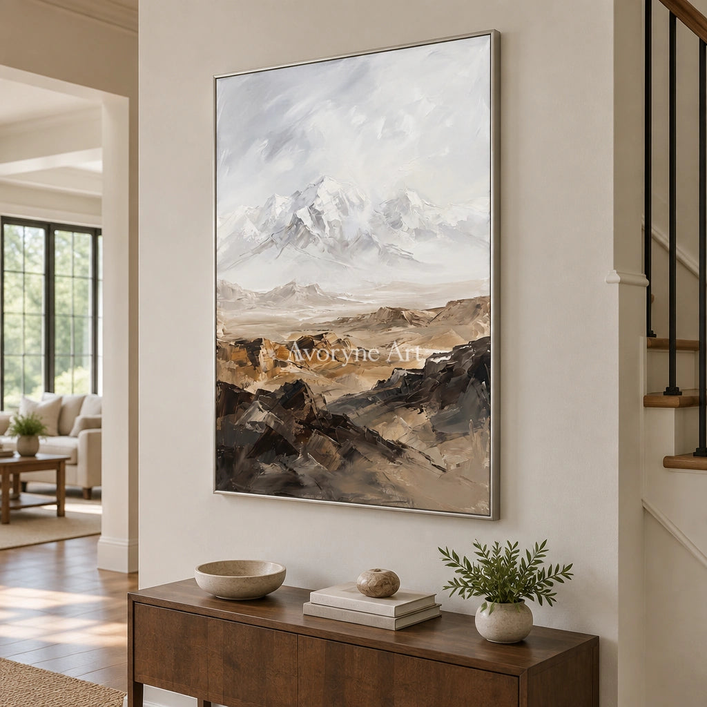 Winding Gesture mountain landscape wall art with a silver frame in an entryway