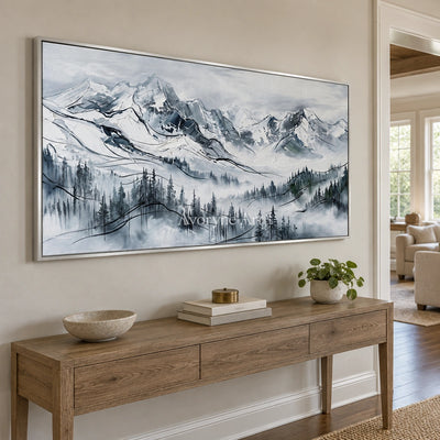 Silver Prelude mountain landscape wall art with a silver frame in an entryway