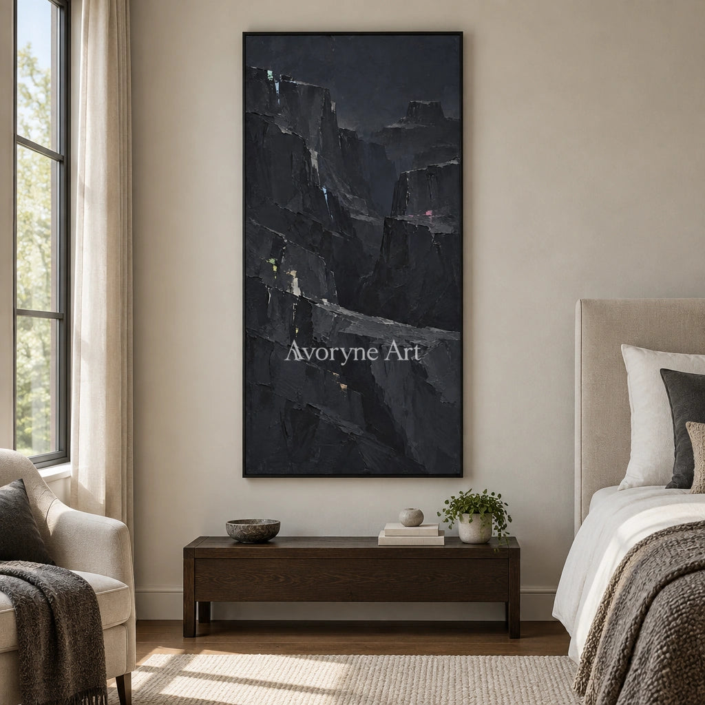 Still Dialogue mountain relief wall art with a black frame above a bed in a bedroom