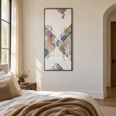Earthen Passage muted geometric art with a black frame above a bed in a bedroom