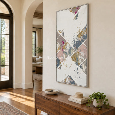 Earthen Passage muted geometric art with a silver frame in an entryway