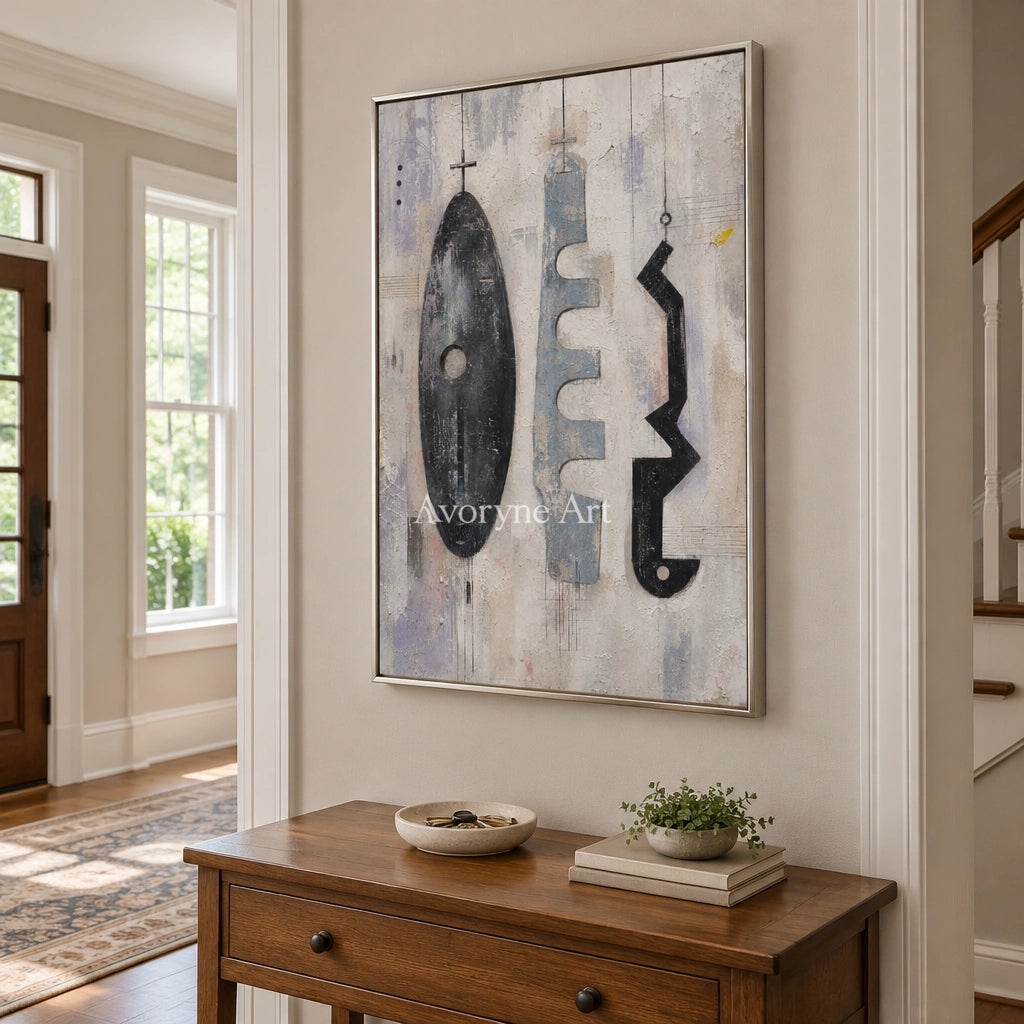Woven Interval muted organic abstract wall art with a silver frame in an entryway
