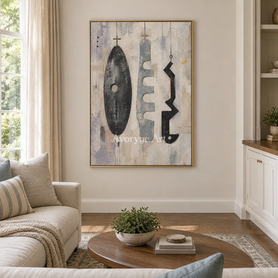 Woven Interval muted organic abstract wall art with a gold frame hanging in a living room