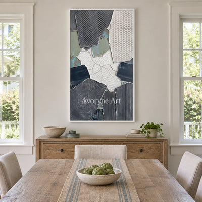 Mineral Memory muted patchwork texture wall art with a white frame in a dining room
