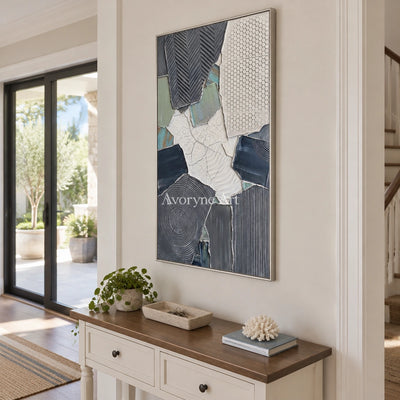Mineral Memory muted patchwork texture wall art with a silver frame in an entryway