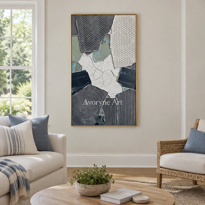 Mineral Memory muted patchwork texture wall art with a gold frame hanging in a living room