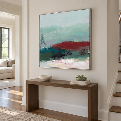 Pale Horizon nature brushwork wall art with a silver frame in an entryway