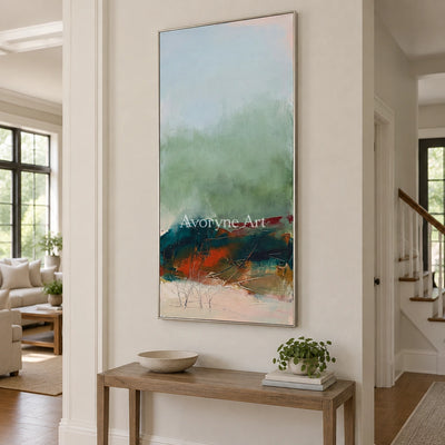 Pale Vista nature brushwork wall art with a silver frame in an entryway
