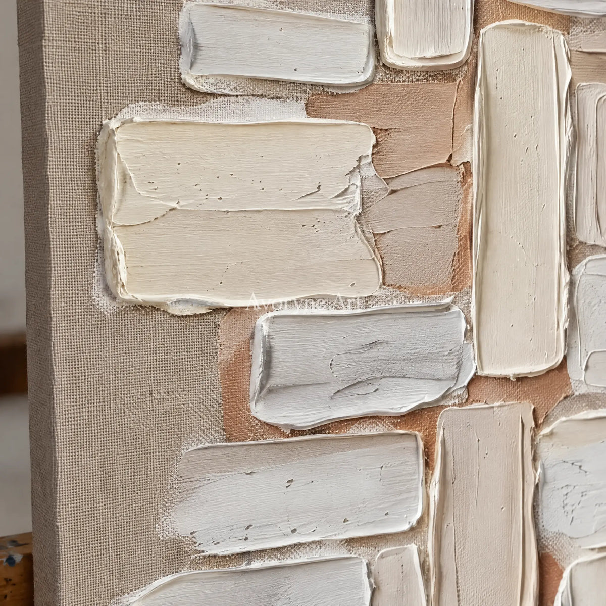 Close-up of the hand-painted texture of Misted Horizon neutral block relief wall art on an easel