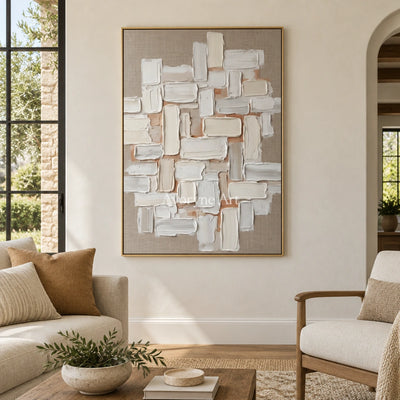 Misted Horizon neutral block relief wall art with a gold frame hanging in a living room
