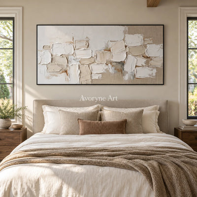 Misted Interval neutral block relief wall art with a black frame above a bed in a bedroom