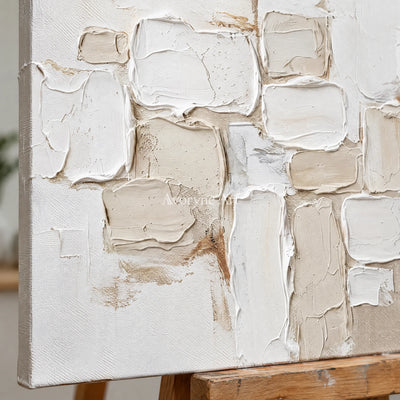 Close-up of the hand-painted texture of Misted Interval neutral block relief wall art on an easel