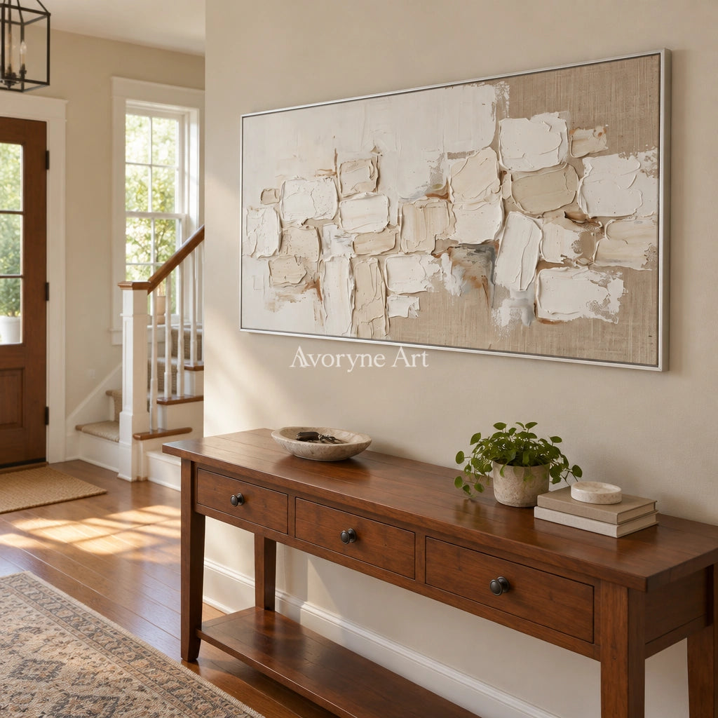 Misted Interval neutral block relief wall art with a silver frame in an entryway
