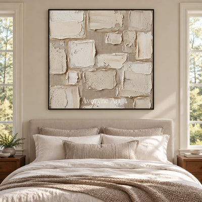 Misted Verse neutral block relief wall art with a black frame above a bed in a bedroom