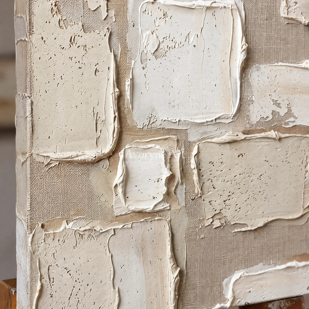 Close-up of the hand-painted texture of Misted Verse neutral block relief wall art on an easel