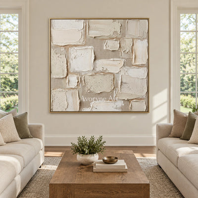 Misted Verse neutral block relief wall art with a gold frame hanging in a living room