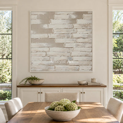 Misted Cadence neutral block relief wall art with a white frame in a dining room