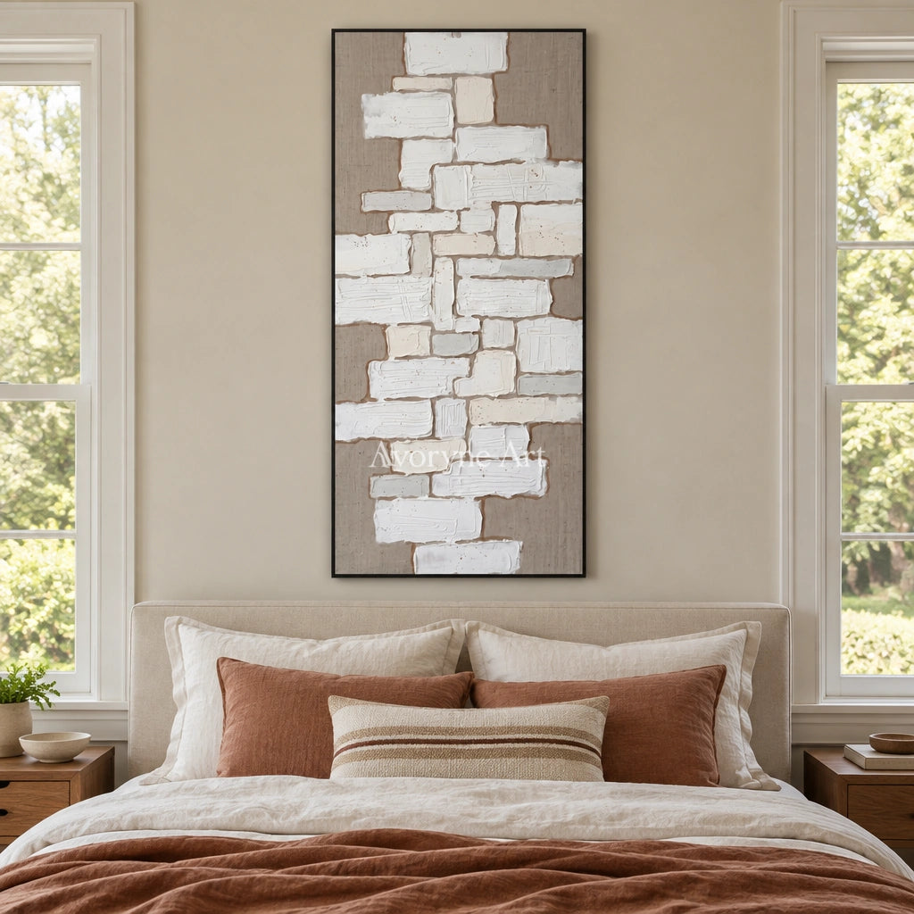 Misted Current neutral block relief wall art with a black frame above a bed in a bedroom