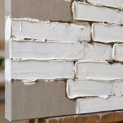Close-up of the hand-painted texture of Misted Gesture neutral block relief wall art on an easel