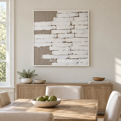 Misted Gesture neutral block relief wall art with a white frame in a dining room