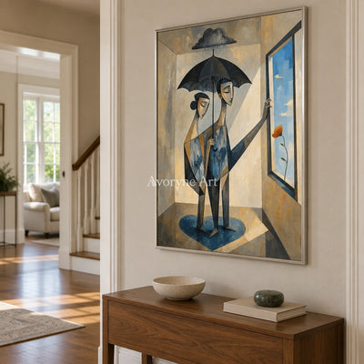 Blue Reverie neutral figure wall art with a silver frame in an entryway