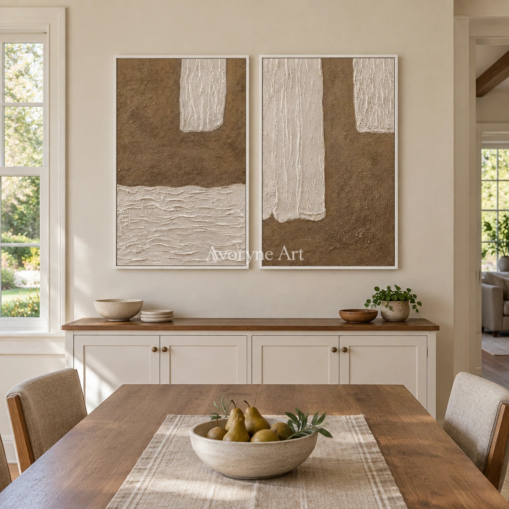 Muted Current neutral fold relief diptych with a white frame in a dining room